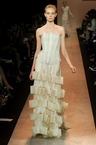 Illustration for article titled Herve Leger's Dresses Will Crush Your Ribs, Beautifully.